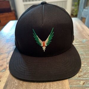 Black Snapback Cap with Embroidered Wing Design